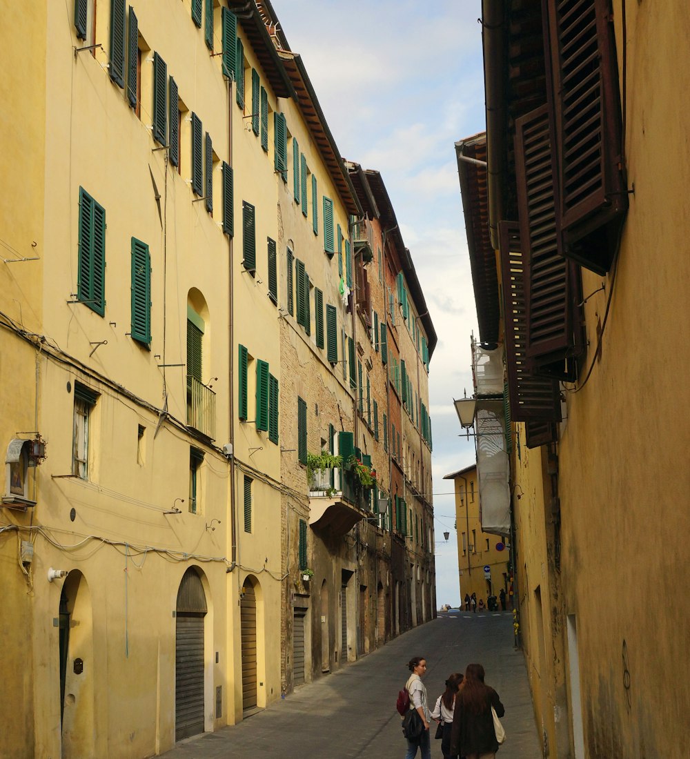Traveler walking through a cobblestone old-town street